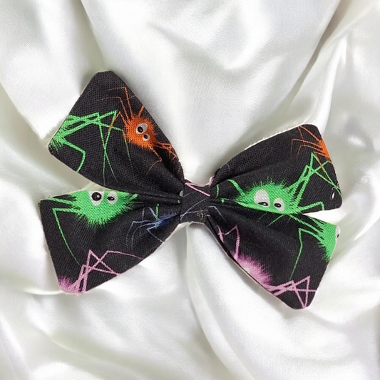 Mini Hair Bow with a colourful cartoon spider character