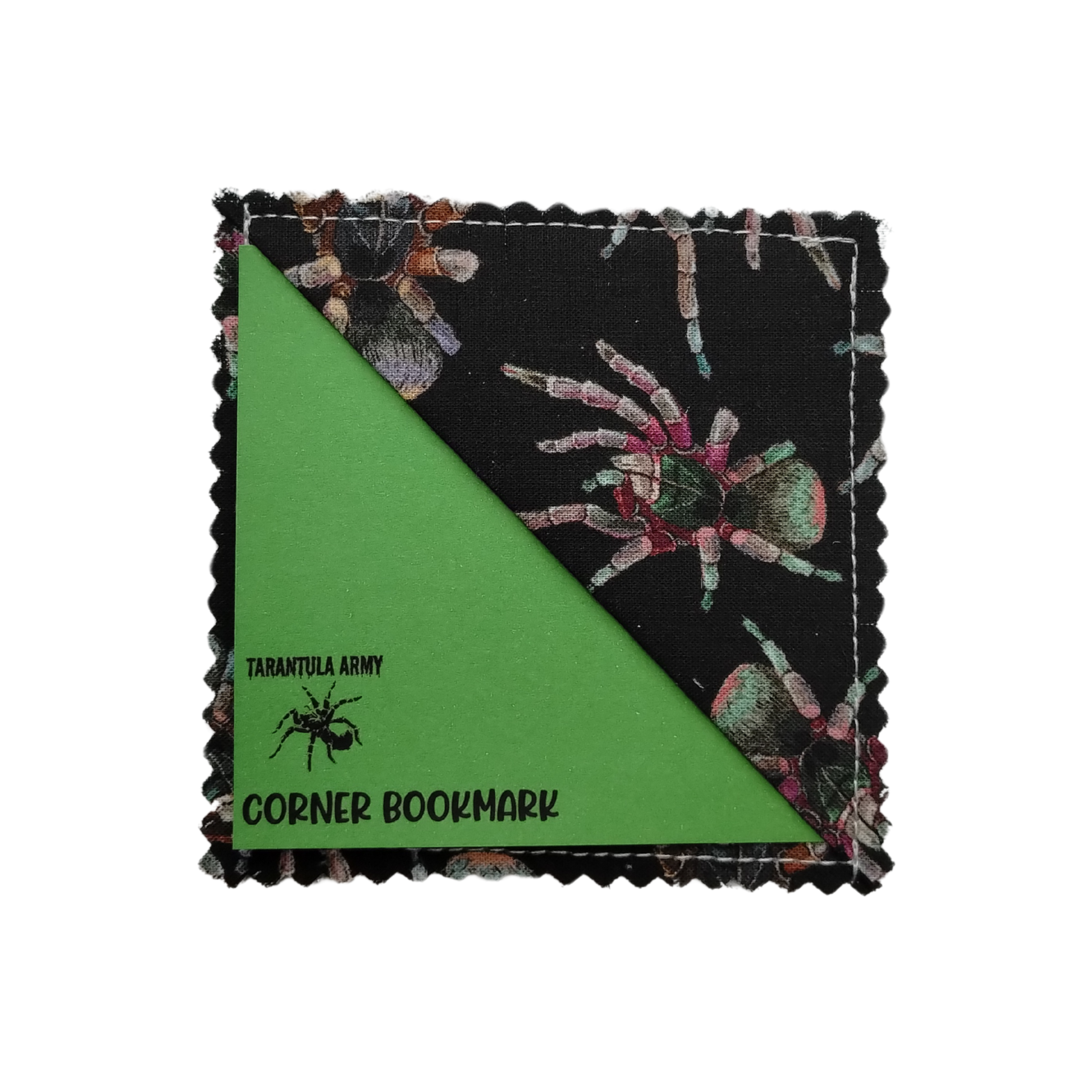 A square fabric bookmark with scalloped edges, featuring a pink, green, and white tarantula spider illustrations.